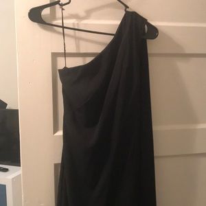 Carmen Marc Valvo black gown with side cape